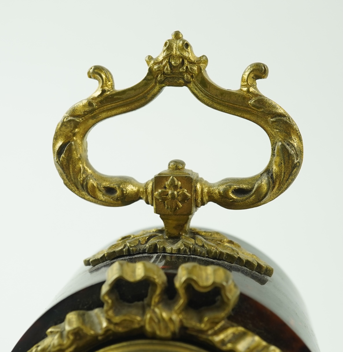 A 19th century French tortoiseshell mantel timepiece
